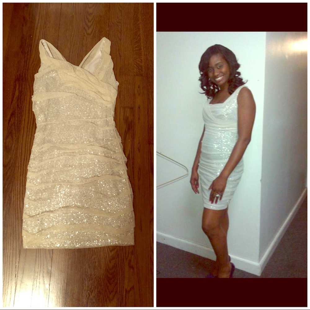 Mid dress silver with light beige covering.